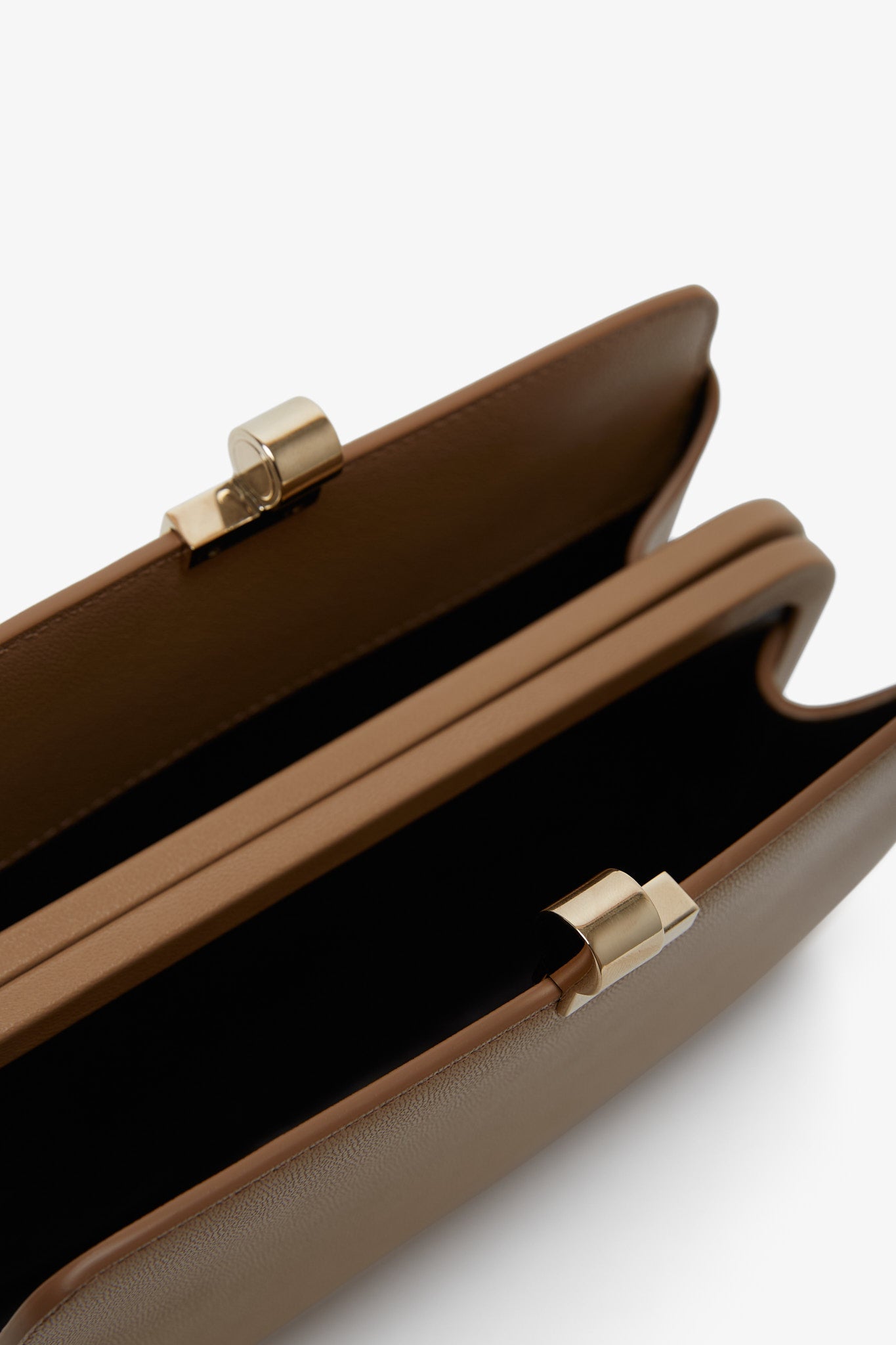The Row | Amazon beige shiny leather clutch | Savannahs