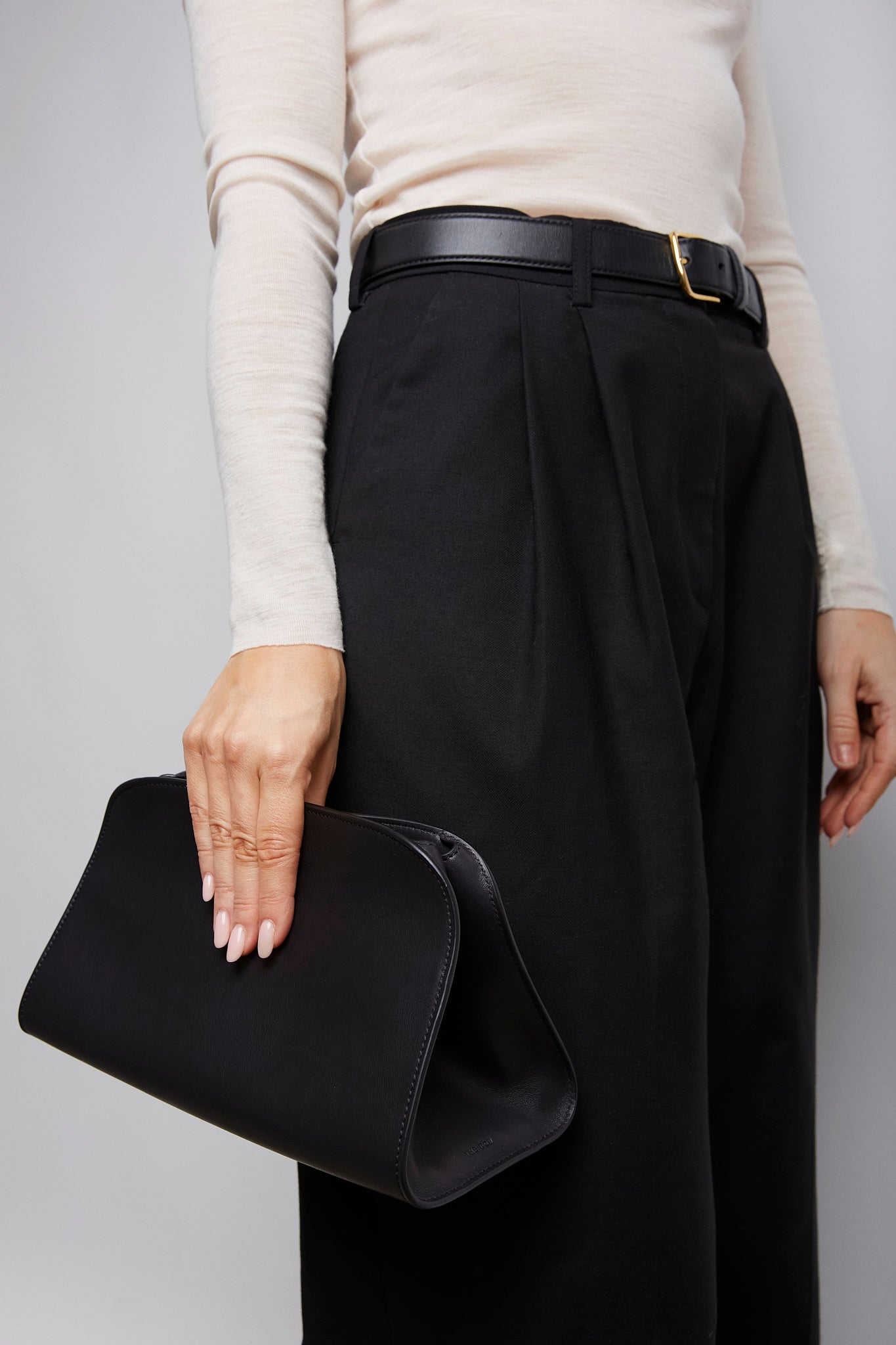 The Row | Peggy black leather clutch | Savannahs