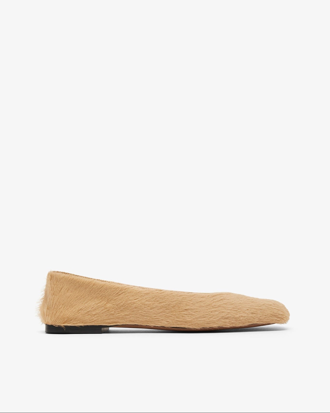 Beige sock with a black sole on a white background