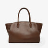 Brown leather handbag on a white background