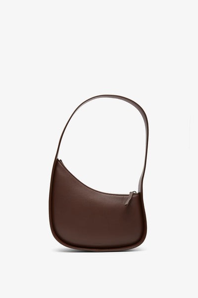Half moon brown leather bag