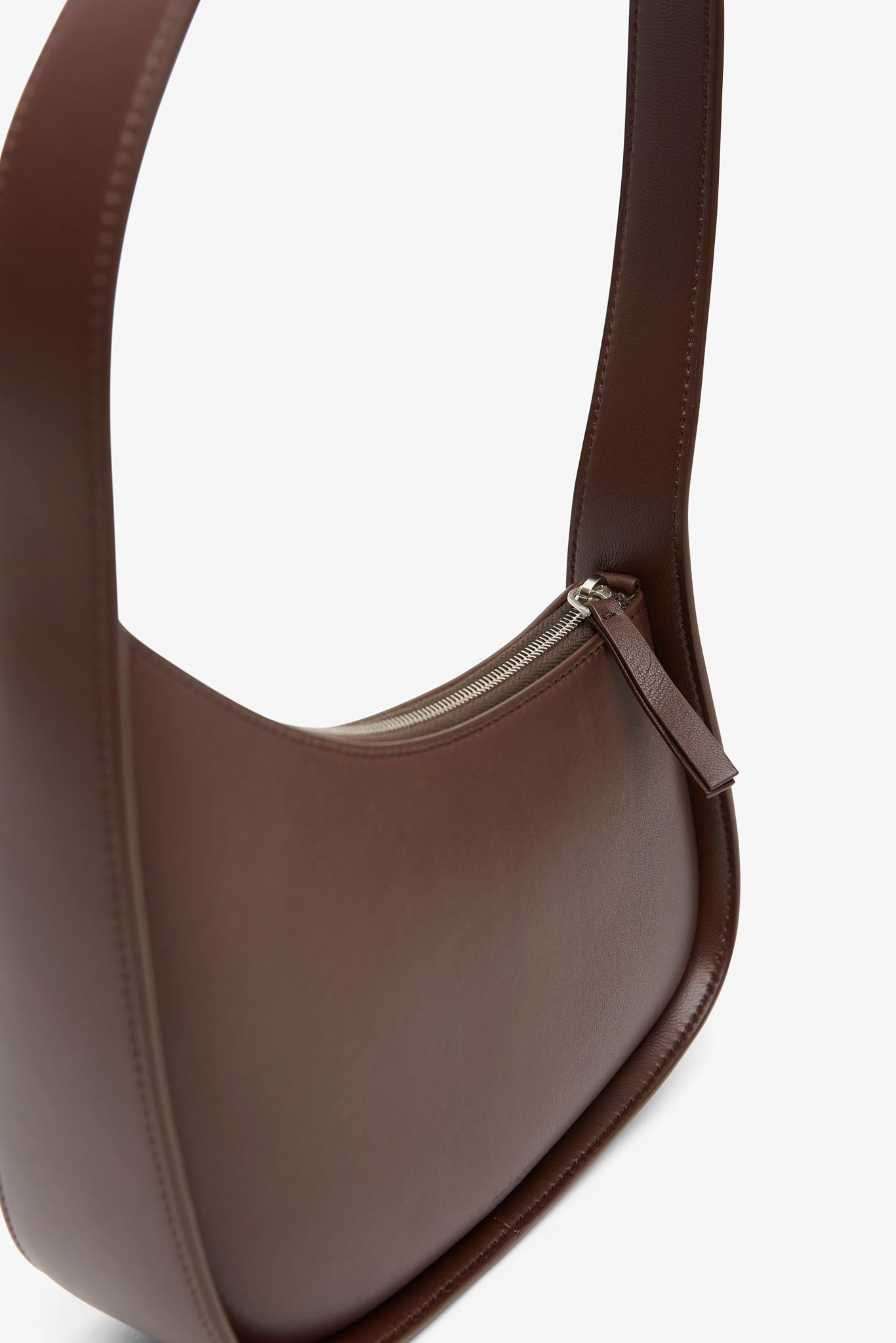 Half moon brown leather bag