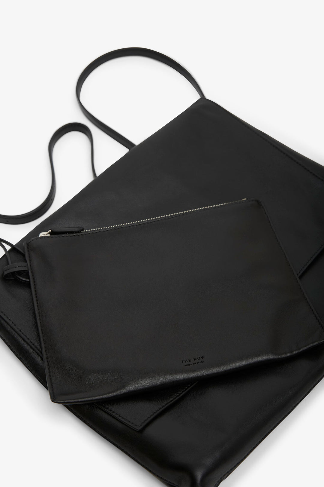 The Row | Nan black leather messenger bag | Savannahs