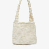 Woven handbag on a white background