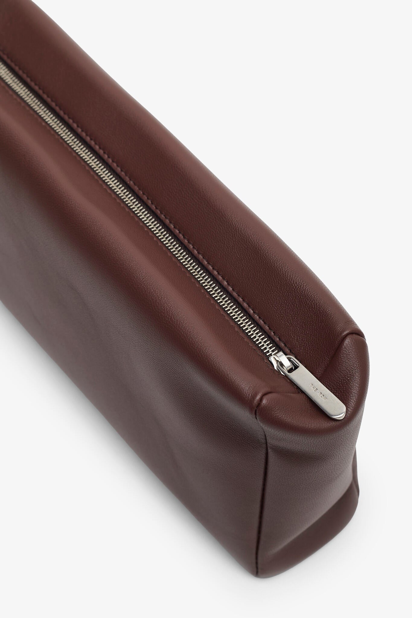 Squared compact brown leather clutch