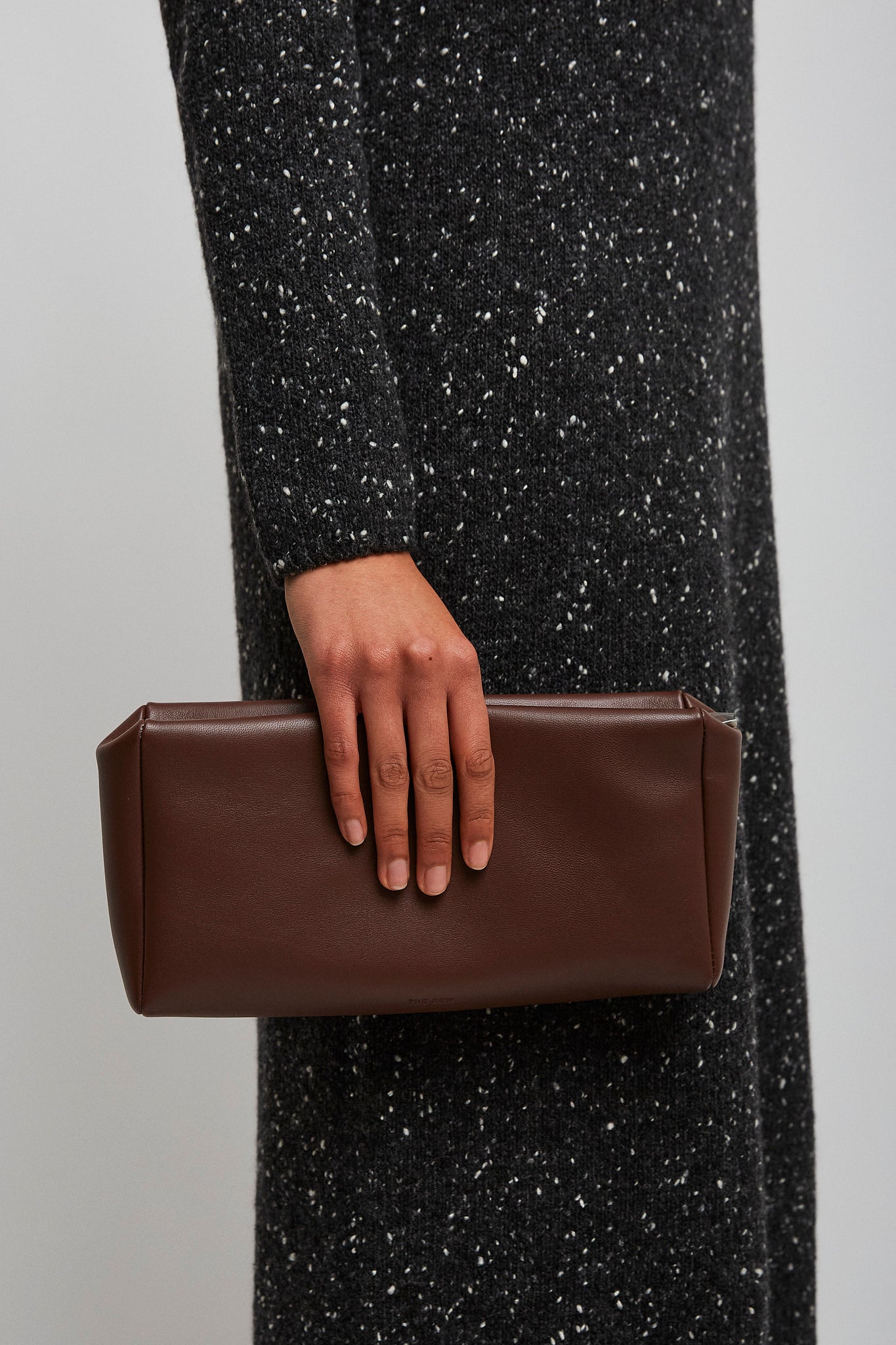 Squared compact brown leather clutch