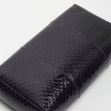 Squared compact black leather clutch