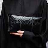 Squared compact black leather clutch
