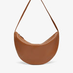 Brown leather handbag on a white background