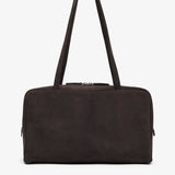 Brown leather handbag with a shoulder strap on a white background