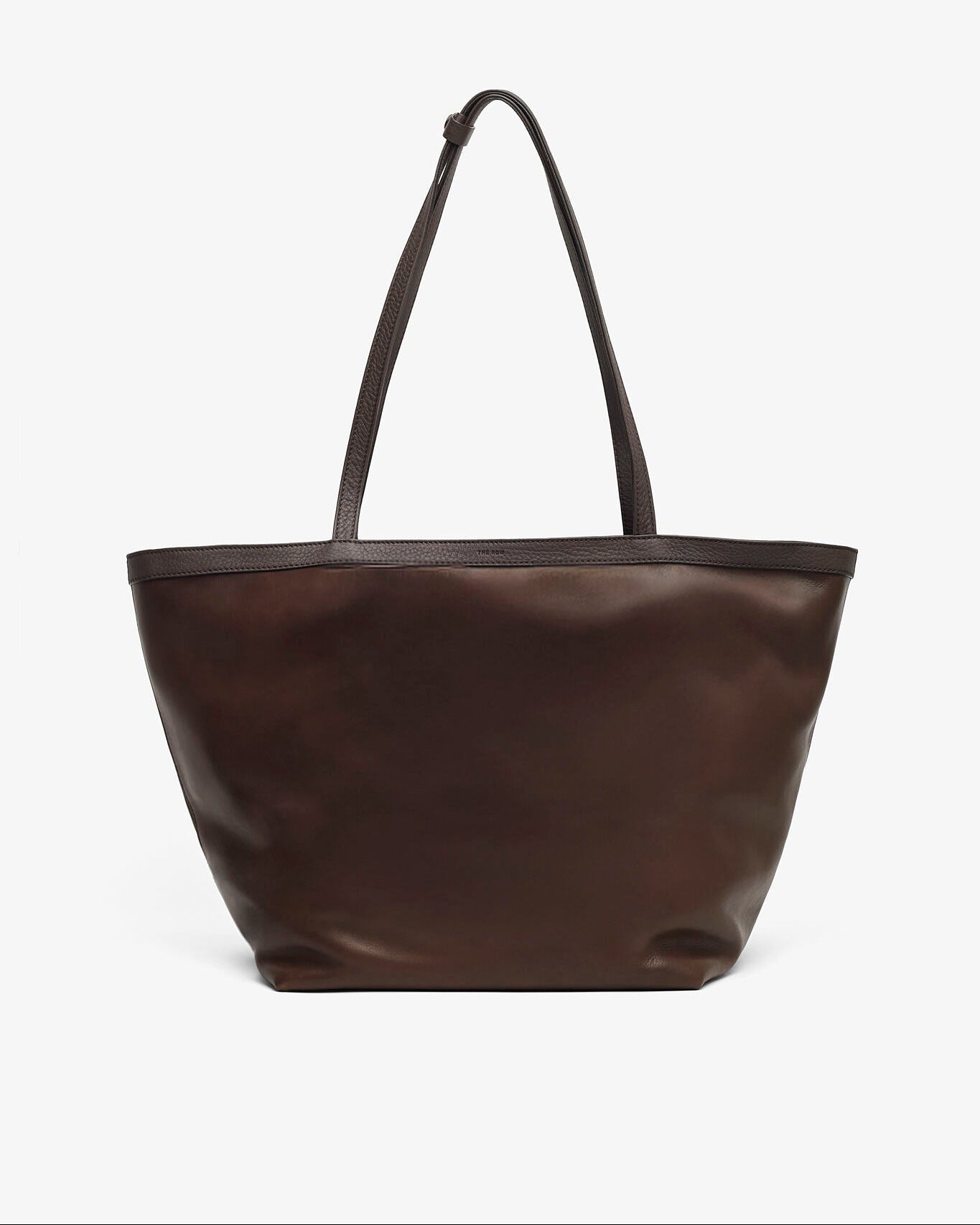 Brown leather tote bag on a white background