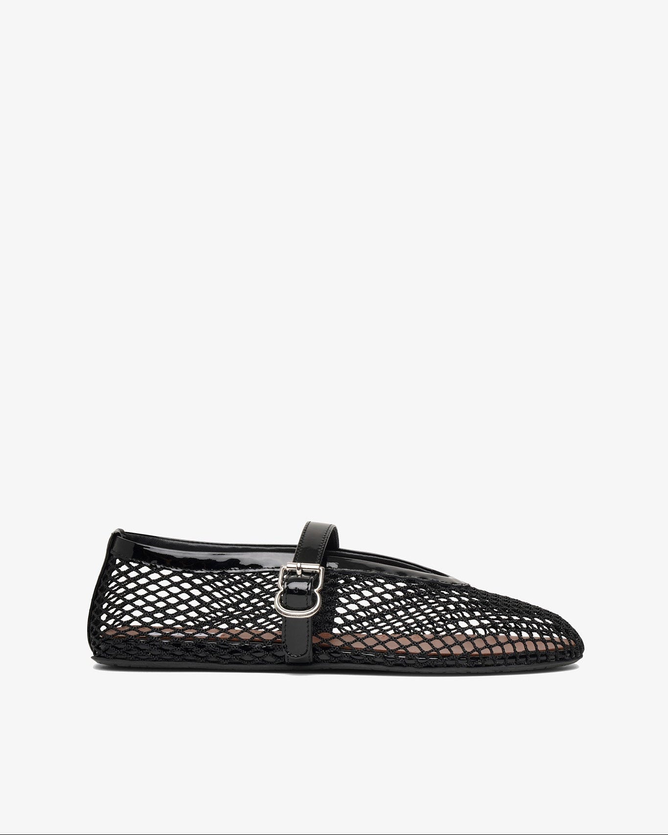 Pair of tan sneakers on a white background