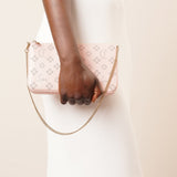 Loubila pink patent pouch