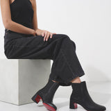 Turelastic 55 black leather ankle boots