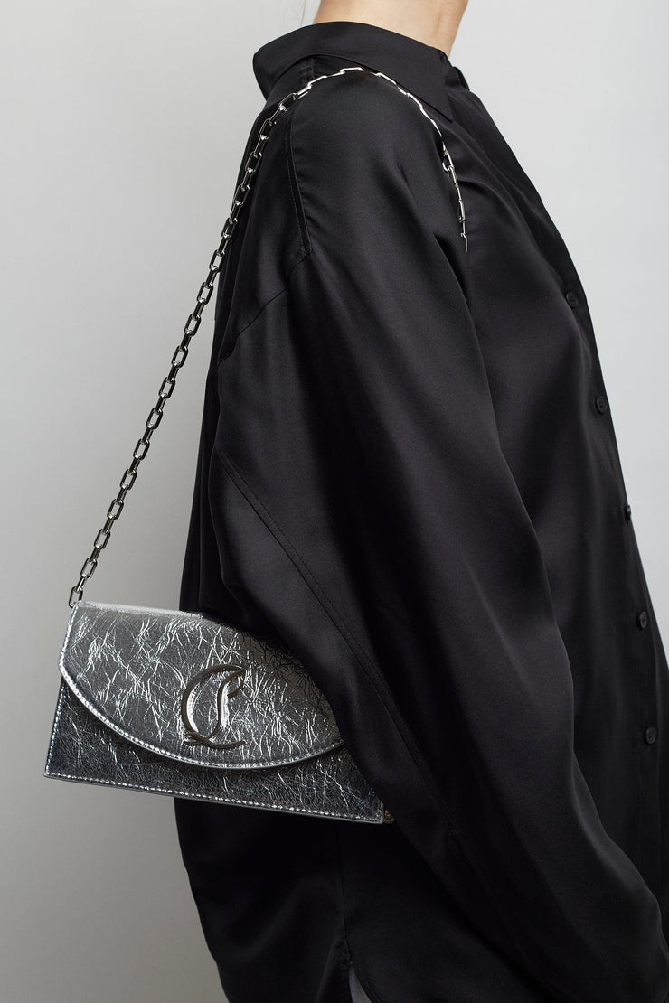 Loubi54 silver clutch