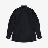 Cocoon black shirt with turned sleeves