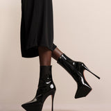 Yigit patent leather ankle boots