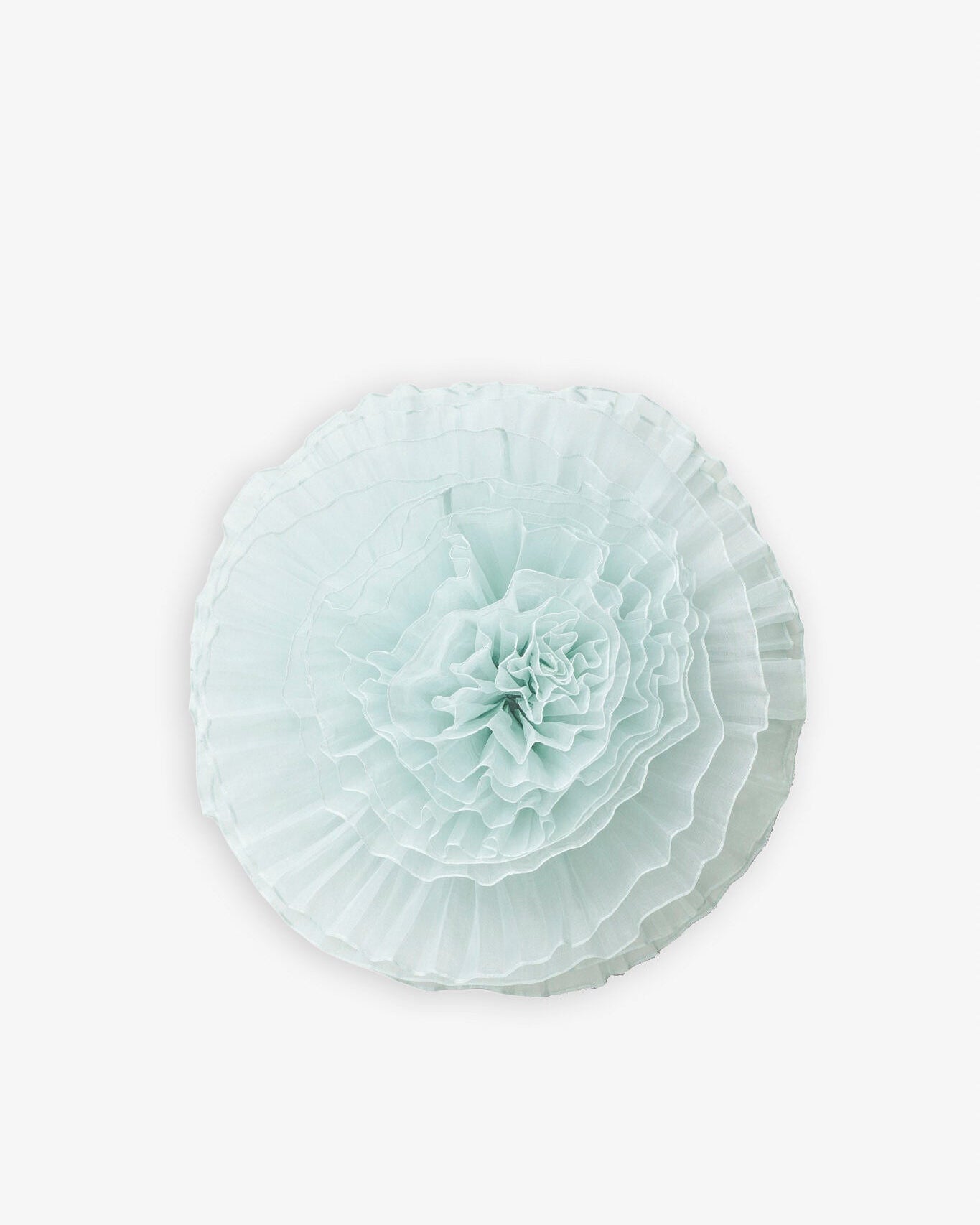 Light blue decorative item on a white background