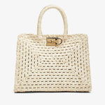 Woven handbag with a gold clasp on a white background