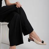 Iconic bow slingback pumps