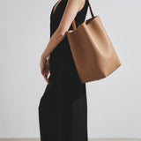 Large N/S beige leather tote bag