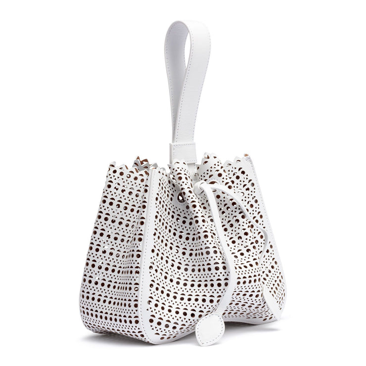 White laser-cut leather bucket bag