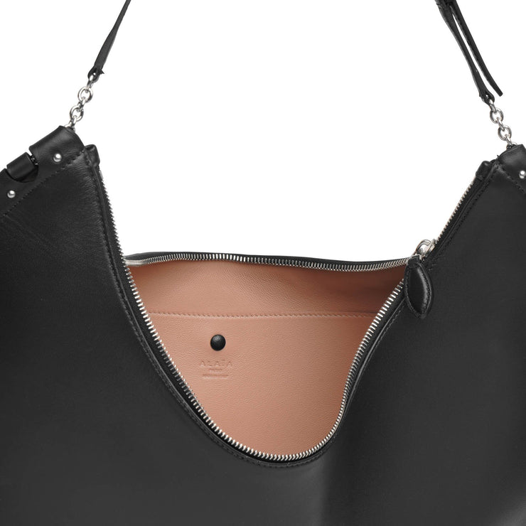 Le Demi Lune Small Leather Shoulder Bag in Pink - Alaia
