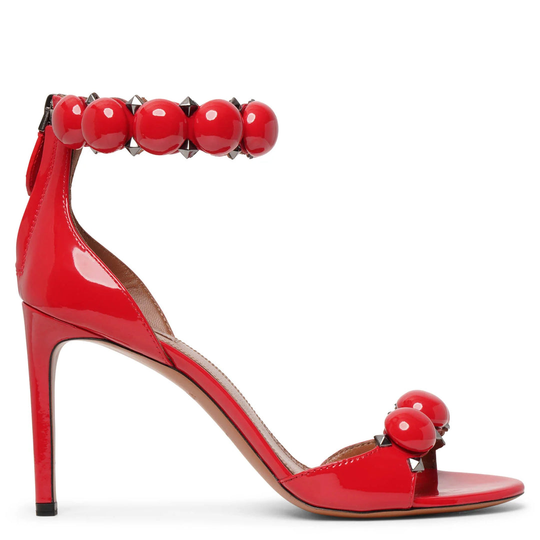 Alaïa | La Bombe 90 patent red sandals | Savannahs