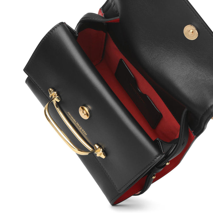 The Story black and red flap bag