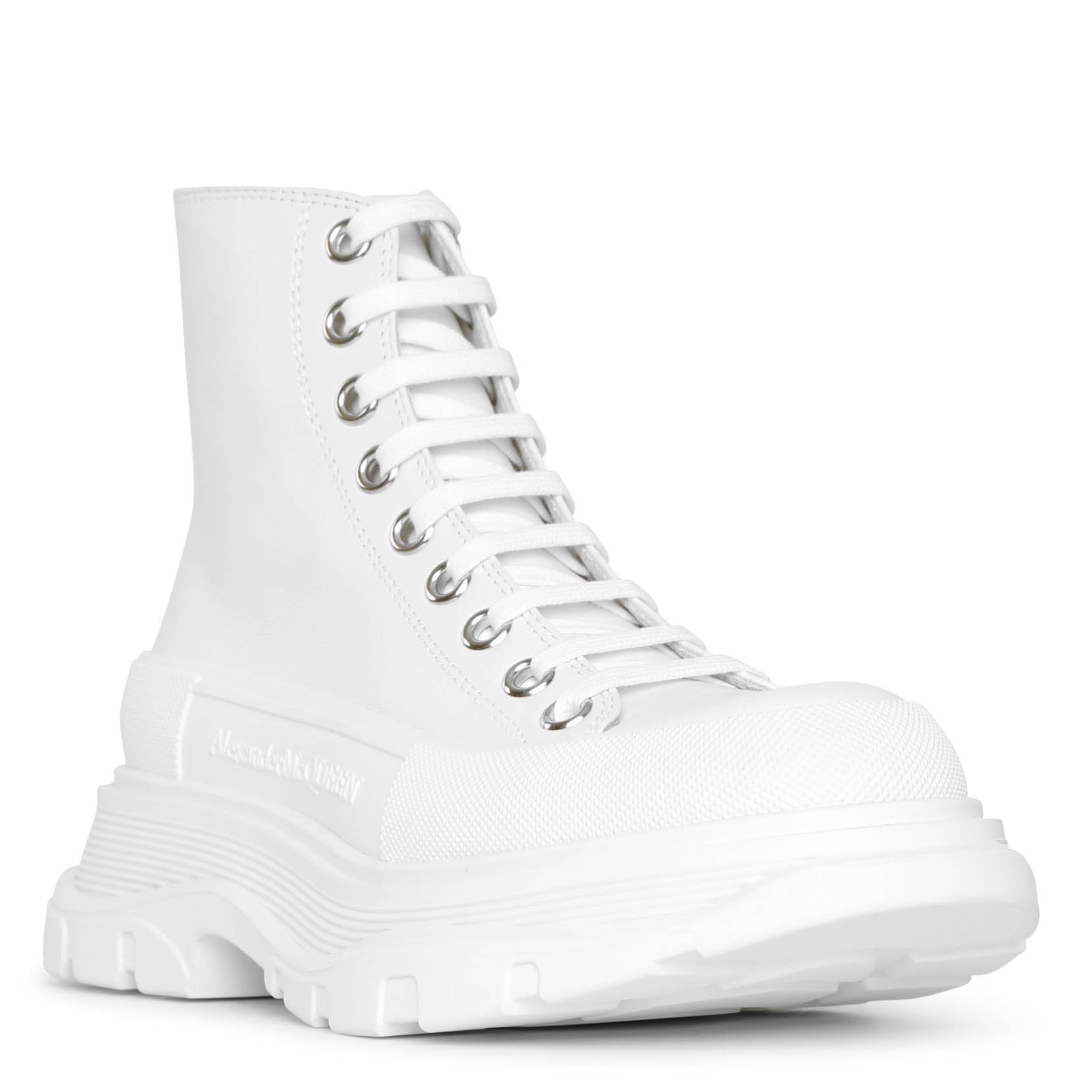 Tread slick high top white leather boots