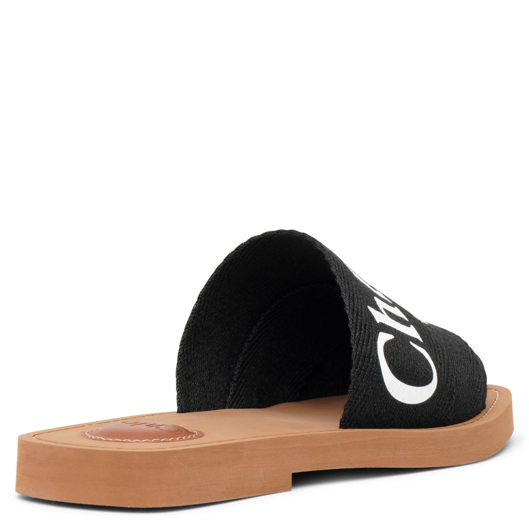 サンダル・ミュール CHLOE' Woody linen flat sandals BLACK Chloé Woody Linen Slides | Saks Fifth Avenue