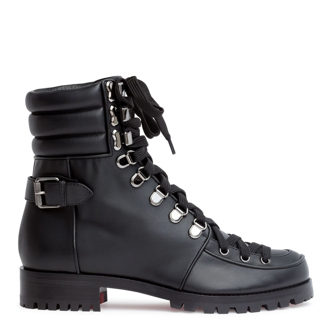 Christian Louboutin | Who Runs black leather boots | Savannahs