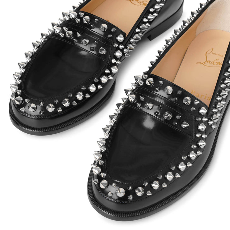 woman christian louboutin spiked loafers