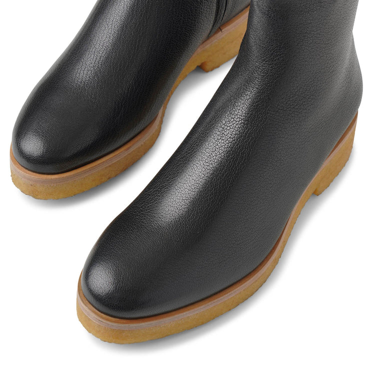 The Row | Boris black leather boots | Savannahs