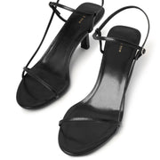 Bare black leather sandals