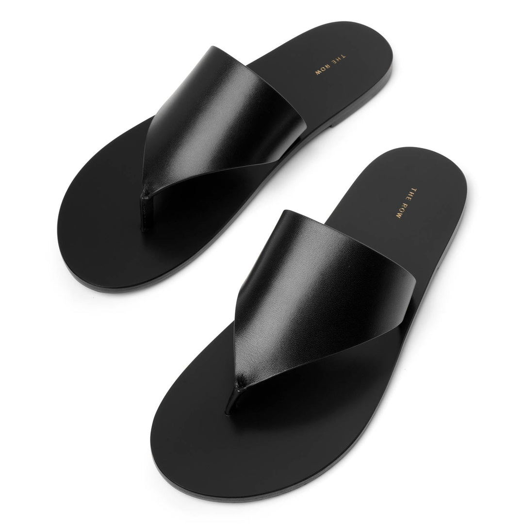 The Row | Avery black leather thong sandals | Savannahs